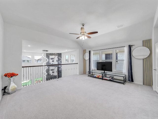 412 Navo Rd, Little Elm, TX 75068 - living room with ceiling fan, carpet, healthy amount of natural light, and lofted ceiling