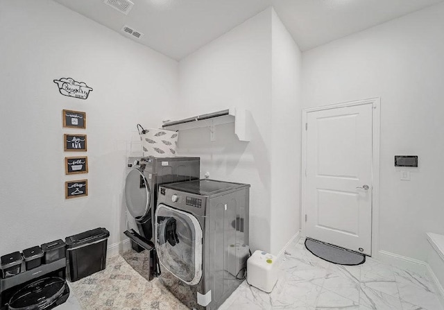 412 Navo Rd, Little Elm, TX 75068 - washroom featuring washing machine and clothes dryer and marble finish floors
