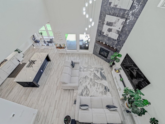 412 Navo Rd, Little Elm, TX 75068 - living area featuring a fireplace and wood finished floors
