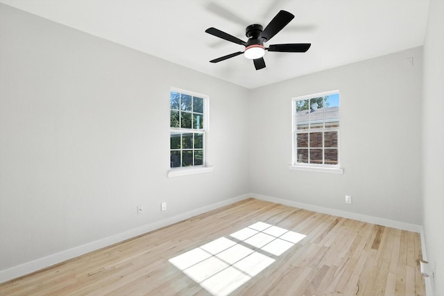 736 Wilson St, Denton, TX 76205 - spare room with healthy amount of natural light, wood finished floors, and a ceiling fan