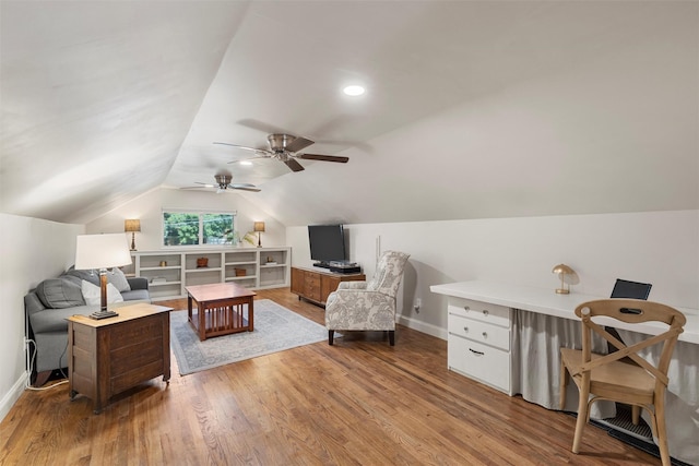5819 Fairview Dr, Waco, TX 76710 - living room featuring vaulted ceiling, wood finished floors, and a ceiling fan
