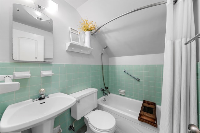 5819 Fairview Dr, Waco, TX 76710 - full bath with shower / tub combo with curtain, tile walls, and lofted ceiling