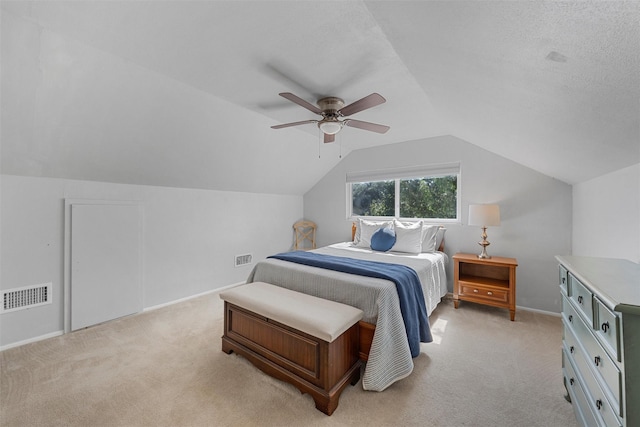 5819 Fairview Dr, Waco, TX 76710 - bedroom featuring light carpet, vaulted ceiling, and a ceiling fan