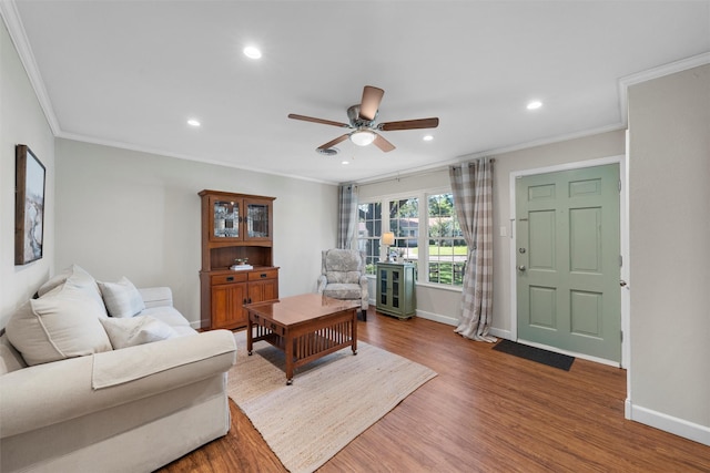 5819 Fairview Dr, Waco, TX 76710 - living area with wood finished floors, ornamental molding, ceiling fan, and recessed lighting