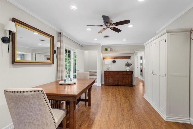 5819 Fairview Dr, Waco, TX 76710 - dining area featuring wood finished floors, recessed lighting, ceiling fan, and crown molding