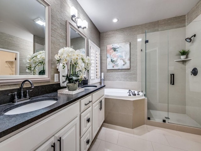 1901 Desoto Dr, Mckinney, TX 75072 - bathroom featuring double vanity, tile patterned floors, a garden tub, a shower stall, and recessed lighting