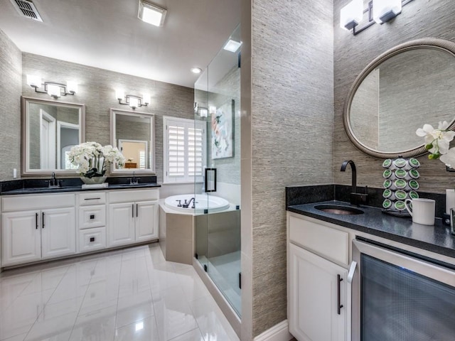 1901 Desoto Dr, Mckinney, TX 75072 - bathroom featuring beverage cooler, double vanity, a shower stall, and tile patterned flooring