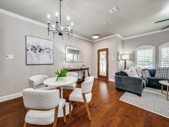 1901 Desoto Dr, Mckinney, TX 75072 - dining space with crown molding, wood finished floors, and a chandelier