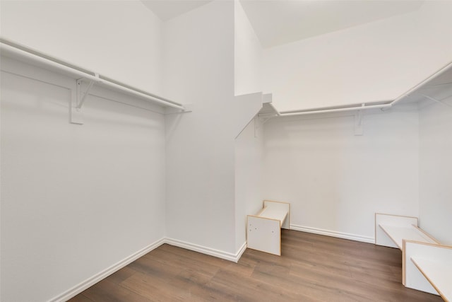 3016 Bryce Dr, Wylie, TX 75098 - walk in closet featuring wood finished floors