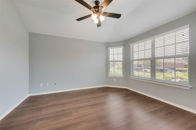 3016 Bryce Dr, Wylie, TX 75098 - empty room with a ceiling fan, vaulted ceiling, and dark wood-style flooring