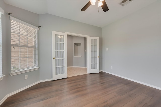 3016 Bryce Dr, Wylie, TX 75098 - unfurnished room featuring french doors, wood finished floors, and a ceiling fan