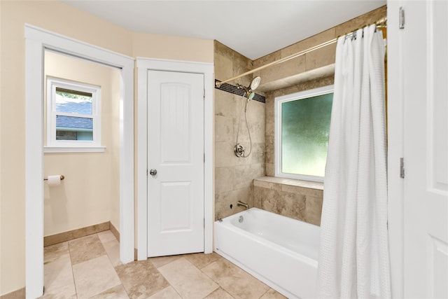 7612 Creekmoore Dr, Fort Worth, TX 76133 - bathroom featuring healthy amount of natural light and shower / bath combination with curtain