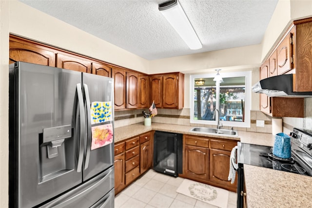 7612 Creekmoore Dr, Fort Worth, TX 76133 - kitchen featuring stainless steel fridge, range with electric stovetop, dishwasher, under cabinet range hood, and light countertops