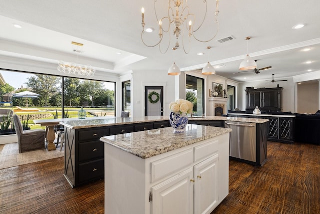 1212 Chandler Cir, Prosper, TX 75078 - kitchen featuring a kitchen island, stainless steel dishwasher, a chandelier, white cabinetry, and light stone countertops