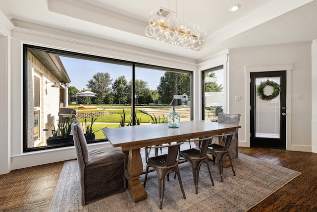 1212 Chandler Cir, Prosper, TX 75078 - dining area with a raised ceiling, a chandelier, recessed lighting, wood finished floors, and crown molding