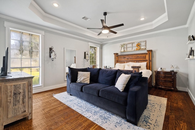 1212 Chandler Cir, Prosper, TX 75078 - living room featuring a raised ceiling, a ceiling fan, dark wood-style flooring, ornamental molding, and recessed lighting