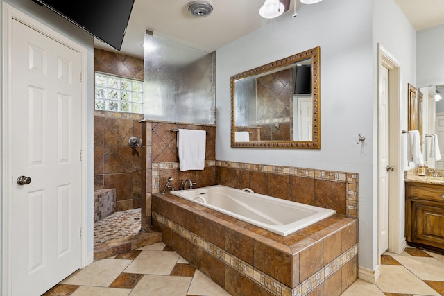 1212 Chandler Cir, Prosper, TX 75078 - bathroom featuring a bath, a walk in shower, and vanity