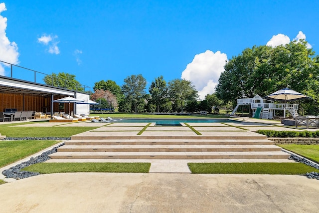 1212 Chandler Cir, Prosper, TX 75078 - view of pool with a lawn and a bocce ball area