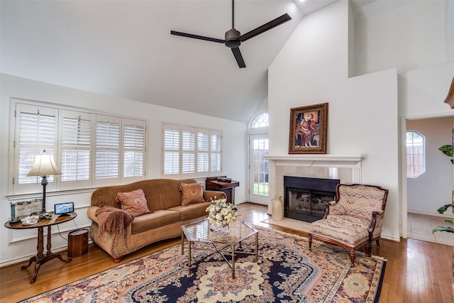1908 Vantage Dr, Plano, TX 75075 - living area with ceiling fan, high vaulted ceiling, a fireplace with flush hearth, and wood finished floors
