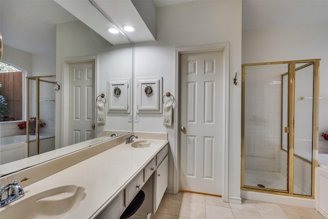1908 Vantage Dr, Plano, TX 75075 - full bathroom with a shower stall, double vanity, tile patterned floors, and recessed lighting