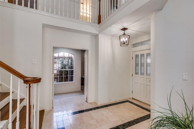1908 Vantage Dr, Plano, TX 75075 - entryway featuring stairway, a chandelier, and a high ceiling