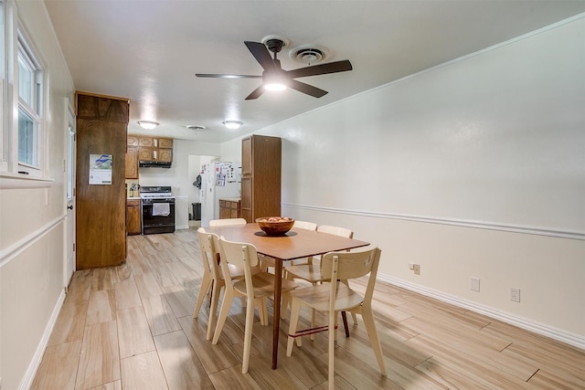 2805 Sadler Ave, Fort Worth, TX 76133 - dining area with a ceiling fan and light wood finished floors