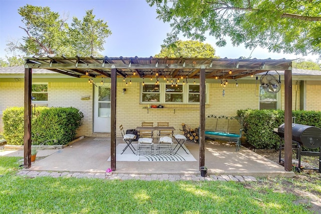 2805 Sadler Ave, Fort Worth, TX 76133 - back of house featuring brick siding, a pergola, and a patio area