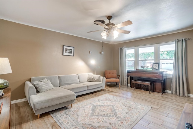 2805 Sadler Ave, Fort Worth, TX 76133 - living room with a ceiling fan, crown molding, and light wood-type flooring