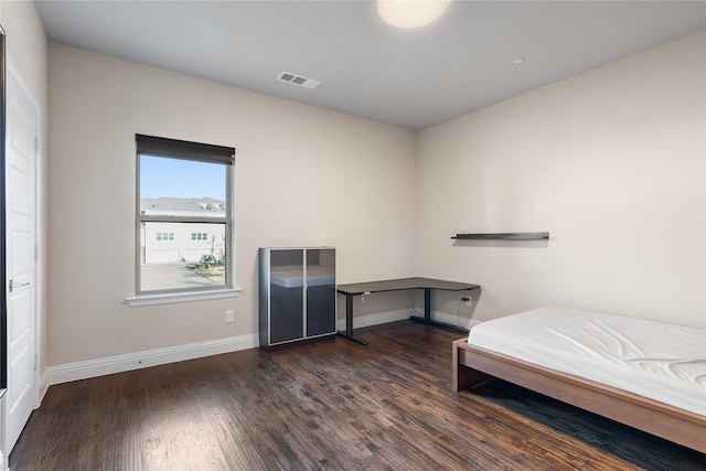 8538 Church St, Frisco, TX 75034 - bedroom with wood finished floors and baseboards