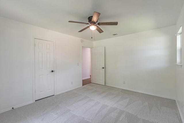 1517 Amherst Dr, Plano, TX 75075 - unfurnished bedroom featuring light carpet and a ceiling fan