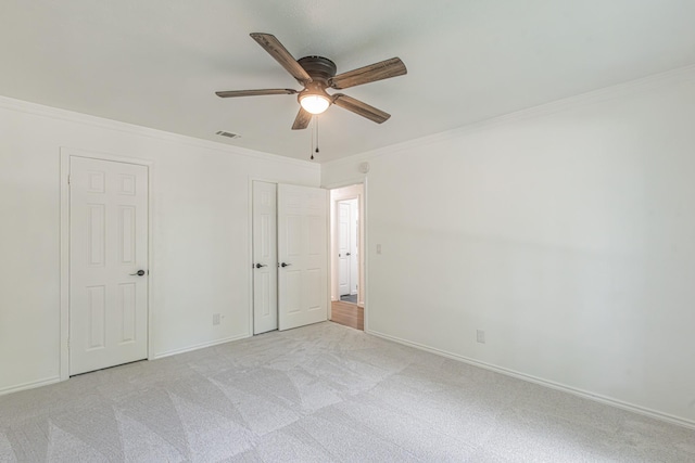 1517 Amherst Dr, Plano, TX 75075 - unfurnished bedroom featuring ornamental molding, light colored carpet, and ceiling fan