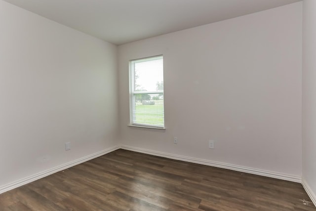 2906 Emma Ln, Mabank, TX 75147 - empty room with dark wood finished floors and baseboards