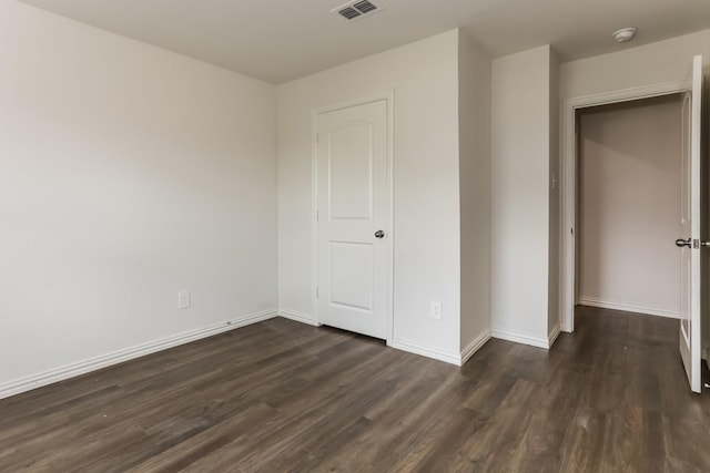 2906 Emma Ln, Mabank, TX 75147 - unfurnished bedroom with dark wood finished floors
