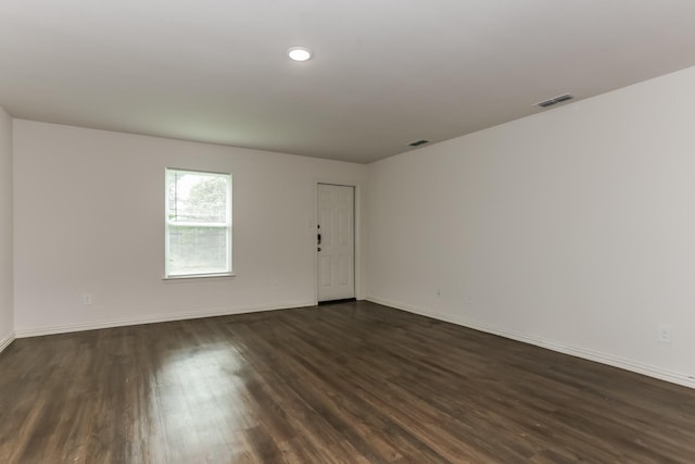 2906 Emma Ln, Mabank, TX 75147 - spare room featuring dark wood-style flooring and recessed lighting