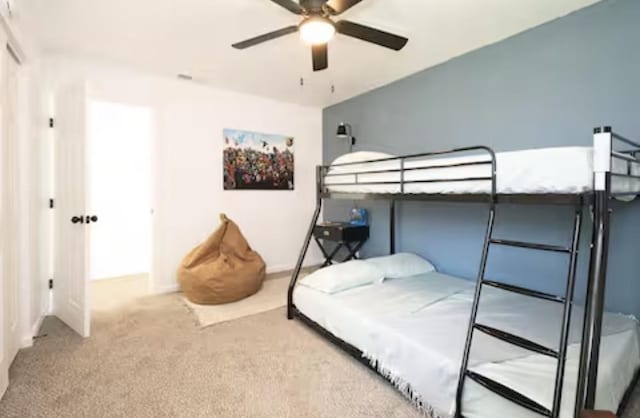 5920 Tourist Dr, North Richland Hills, TX 76117 - carpeted bedroom with a ceiling fan