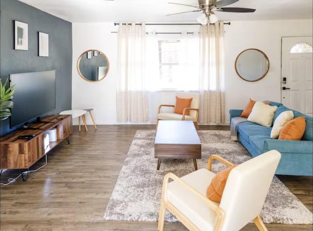 5920 Tourist Dr, North Richland Hills, TX 76117 - living room with wood finished floors, plenty of natural light, and a ceiling fan