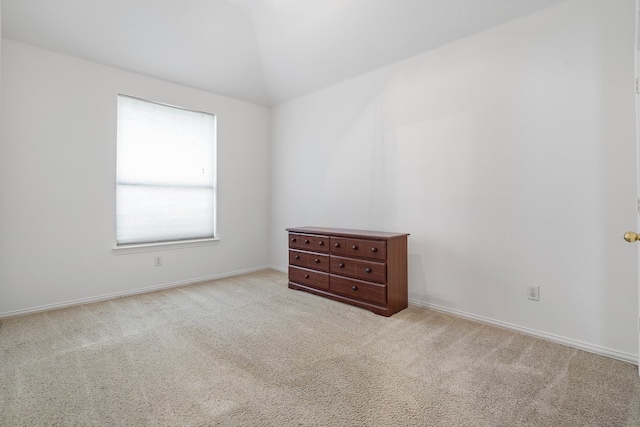 6716 Armstrong Ct, Fort Worth, TX 76137 - carpeted spare room with vaulted ceiling and baseboards