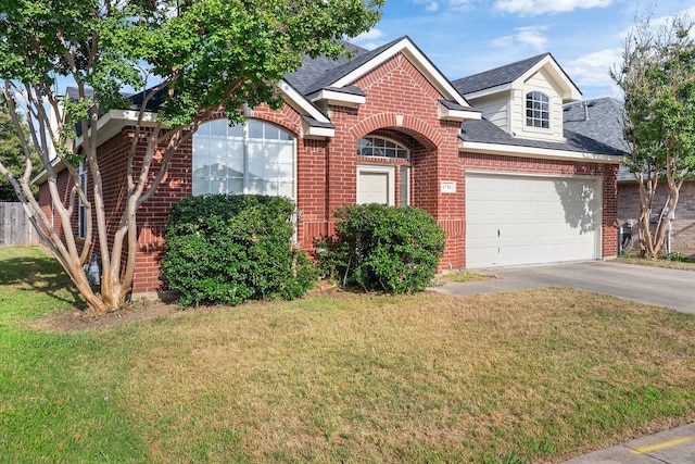 6716 Armstrong Ct, Fort Worth, TX 76137 - traditional home featuring brick siding, driveway, a shingled roof, and a front yard