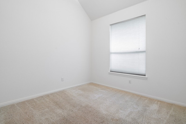 6716 Armstrong Ct, Fort Worth, TX 76137 - carpeted empty room featuring vaulted ceiling and baseboards