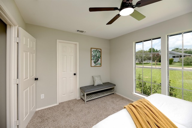 4817 Springsong Ln, Arlington, TX 76017 - bedroom with light colored carpet and ceiling fan