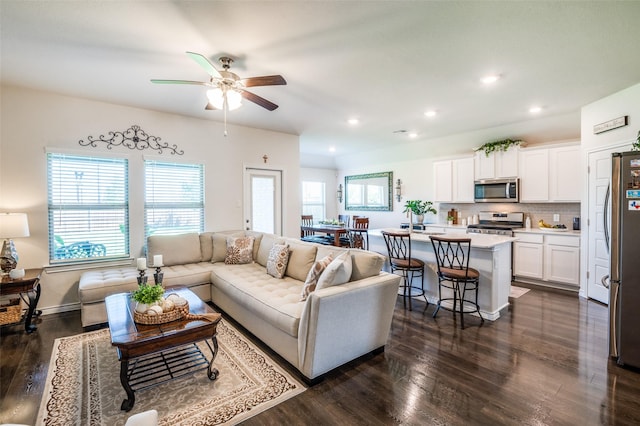 595 Yucca Ct, Princeton, TX 75407 - living area with dark wood finished floors, recessed lighting, and a ceiling fan