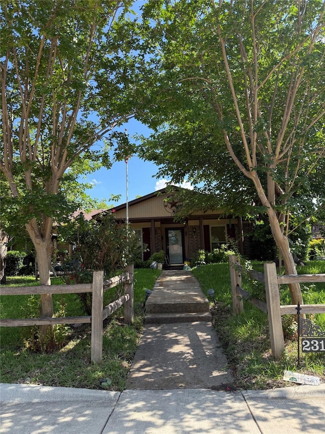 2312 Warm Springs Rd, Mesquite, TX 75149 - view of front of home featuring a fenced front yard and brick siding
