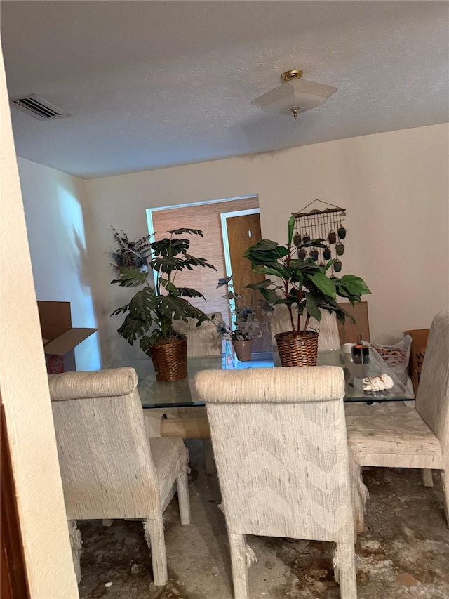 2312 Warm Springs Rd, Mesquite, TX 75149 - dining area with unfinished concrete floors