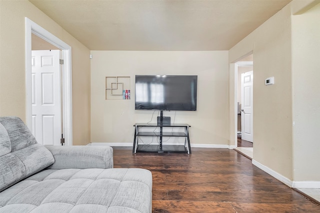 3624 Hardeman St, Fort Worth, TX 76119 - living room featuring wood finished floors and baseboards