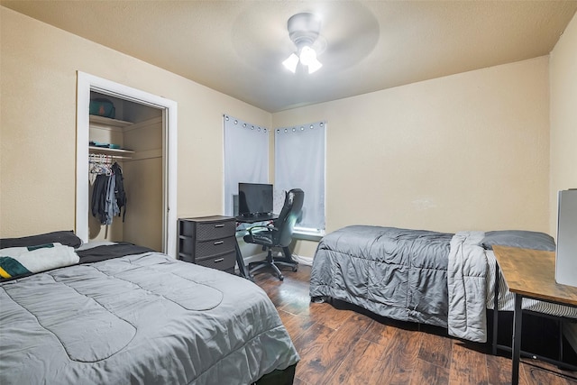3624 Hardeman St, Fort Worth, TX 76119 - bedroom with dark wood-style floors and a closet