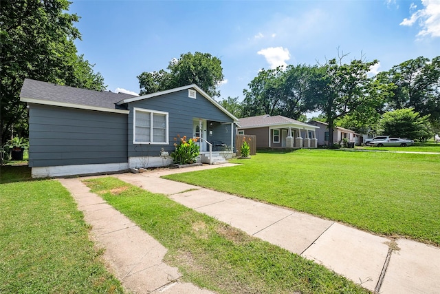 3624 Hardeman St, Fort Worth, TX 76119 - ranch-style house with a porch and a front lawn