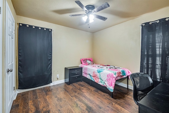 3624 Hardeman St, Fort Worth, TX 76119 - bedroom featuring dark wood-style flooring and ceiling fan