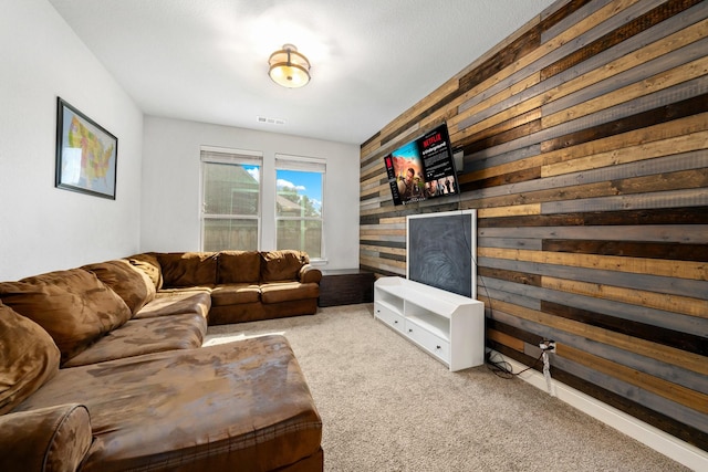 705 Rio Concho Trl, Mckinney, TX 75071 - carpeted living area featuring wooden walls
