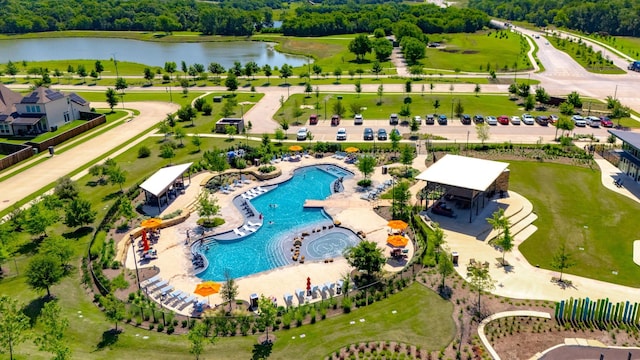 705 Rio Concho Trl, Mckinney, TX 75071 - drone / aerial view of a large body of water and a pool area