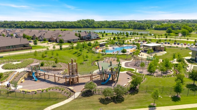 705 Rio Concho Trl, Mckinney, TX 75071 - bird's eye view of a pool and a large body of water
